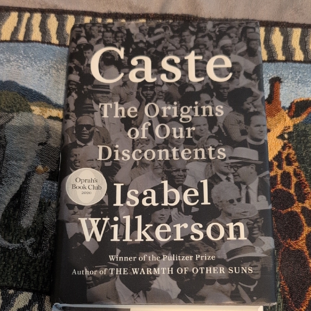Book Hardcover Caste: The Origins of Our Discontents by Isabel Wilkerson